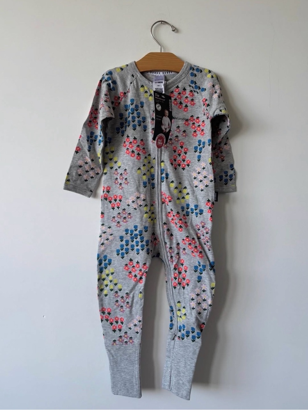 Bonds Gray Floral-Print Zip Front Kids Bodysuit with Pink Blue Yellow Accents